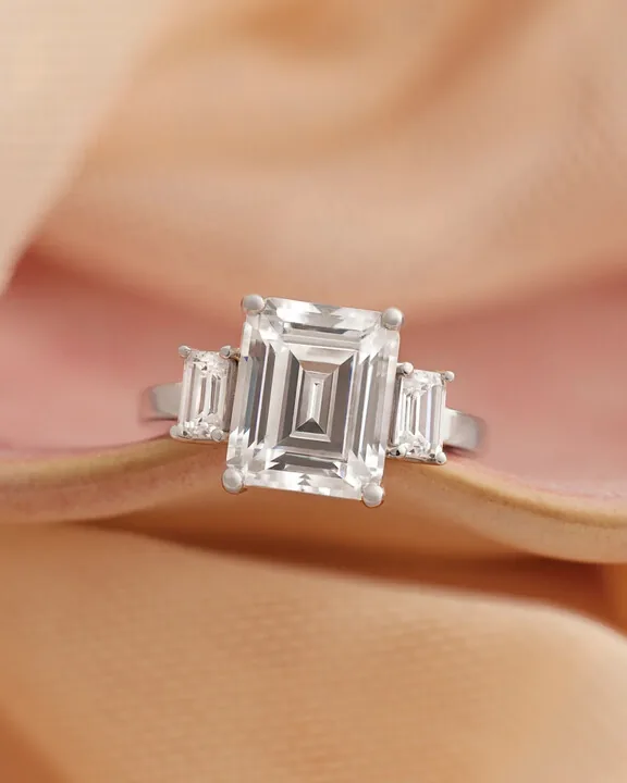 Emerald cut vs. Asscher: elongated elegance or square architecture?